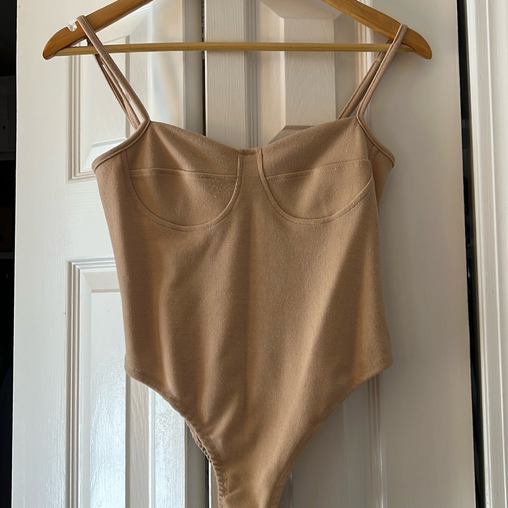 body suit in mauve/ cream color
